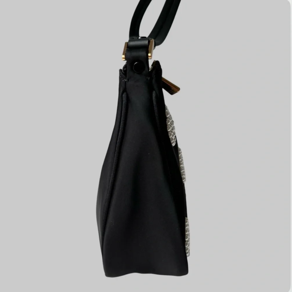 Kate Spade Embellished durable woven nylon with leather trim Matte lining